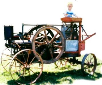 Apple blossoms & antique farm machinery Image